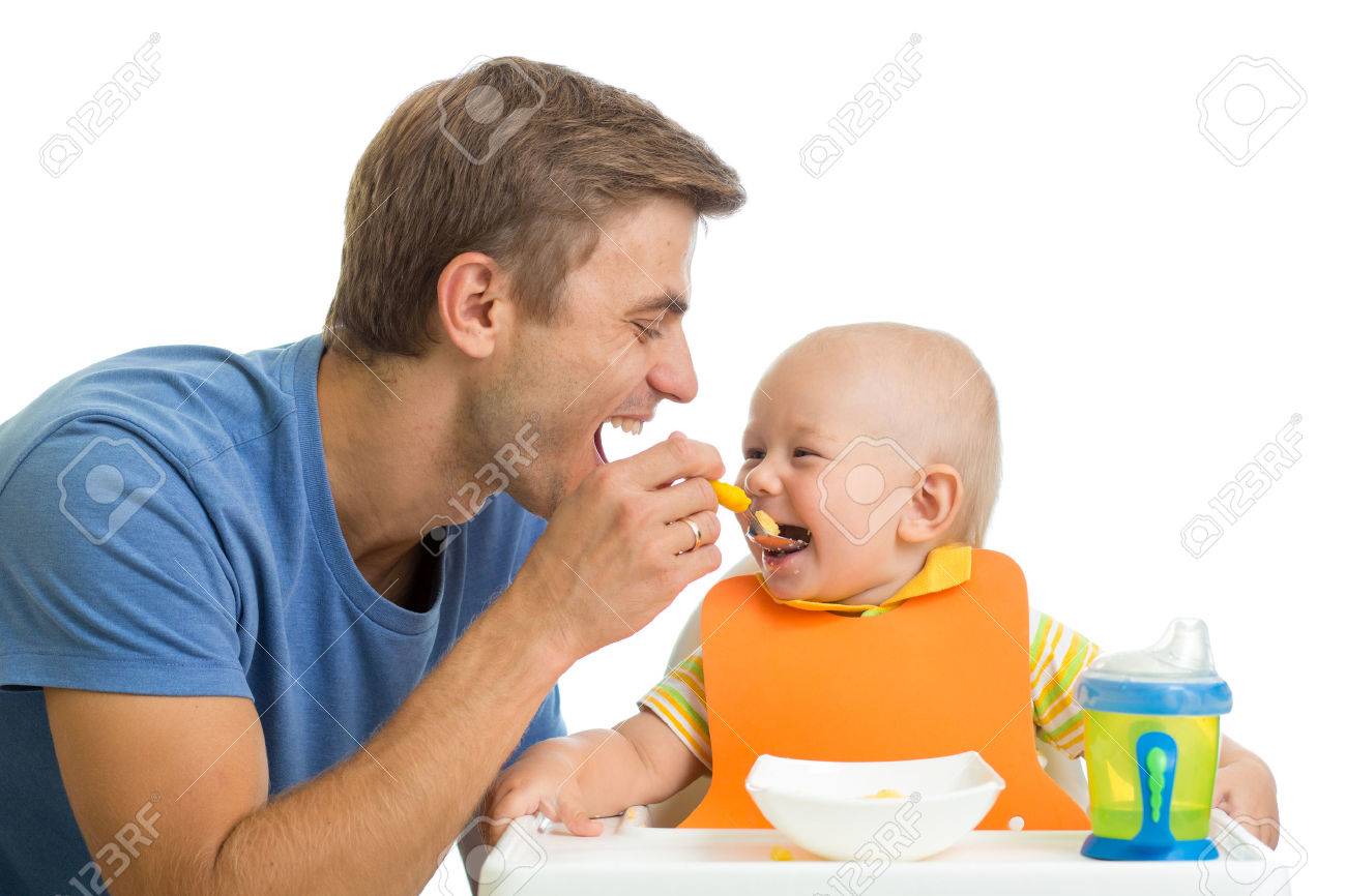 32761928-father-feeding-baby-son.jpg